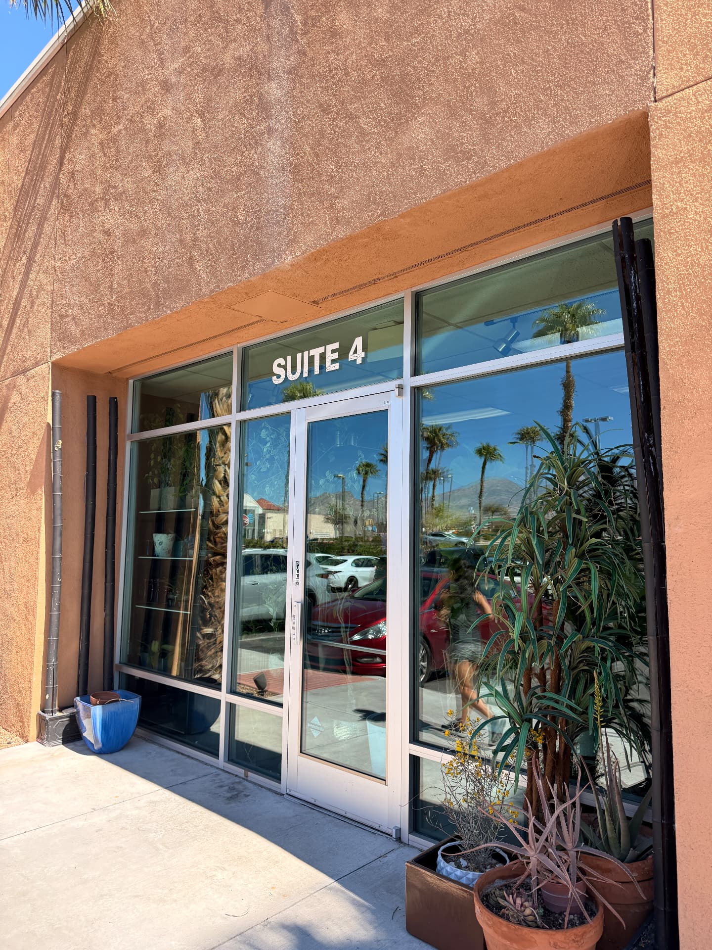 Spotless storefront glass and door at Suite 4